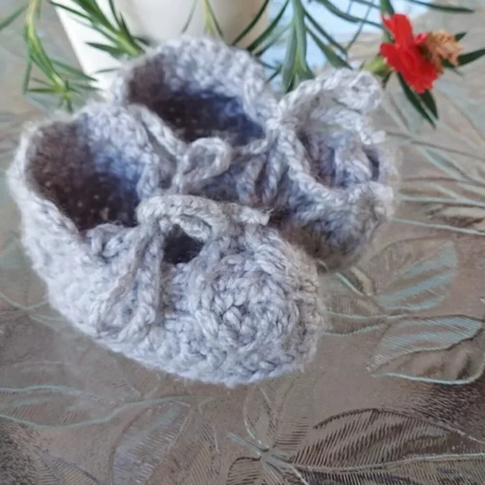 Handmade baby booties.